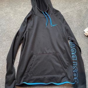 Medium Nike women’s black hoodie w/ blue nike sign